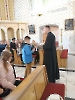 Spotkanie z rodzicami i dziećmi, które w tym roku szkolnym przystąpią do I Komunii Świętej, rozdanie książeczek, 18 września 2022 r.